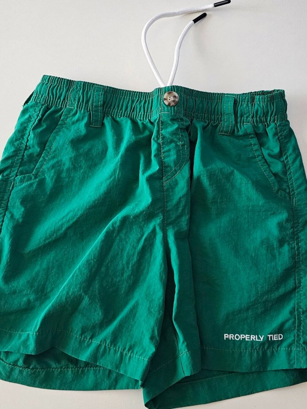 Properly tied kids size ys